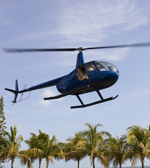 Robinson R44 taking off